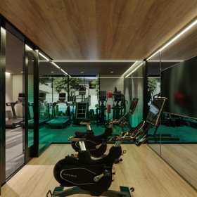 Open and well-lit fitness center at Sonoran Row in Phoenix, AZ