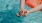 a person's feet in the water